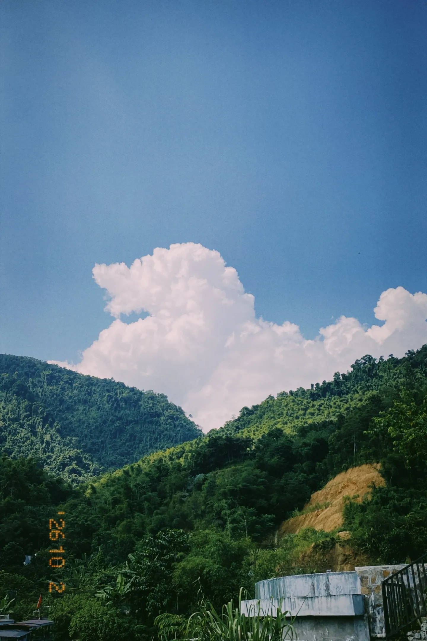 Green mountains under a summer sky in northern Vietnam